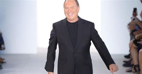 michael kors acquisition|michael kors bought versace.